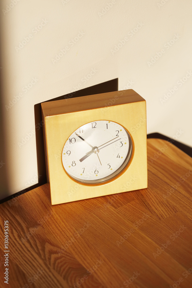Close-Up Of Alarm Clock On Wooden Table Close-Up Of Alarm Clock On Wooden Table