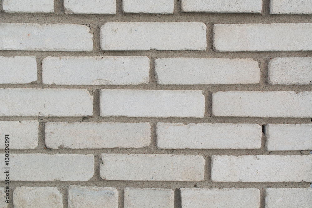 White brick wall with horizontal masonry. Background White brick wall with horizontal masonry. Background