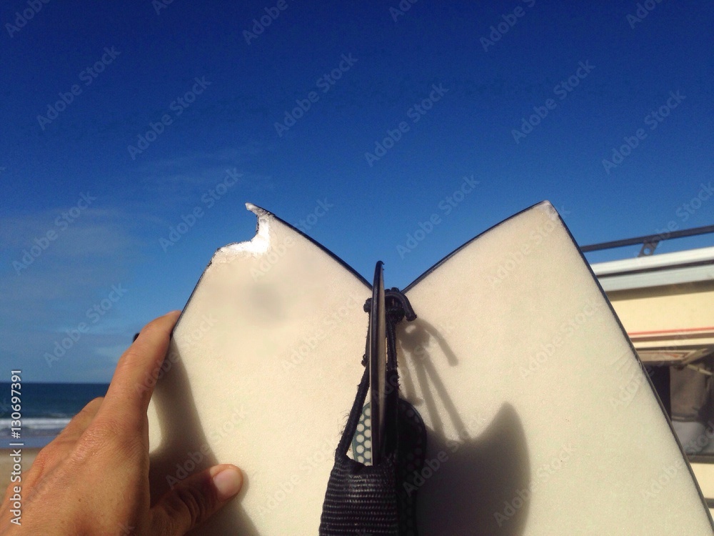 Broken surfboard after surf session Stock Photo | Adobe Stock