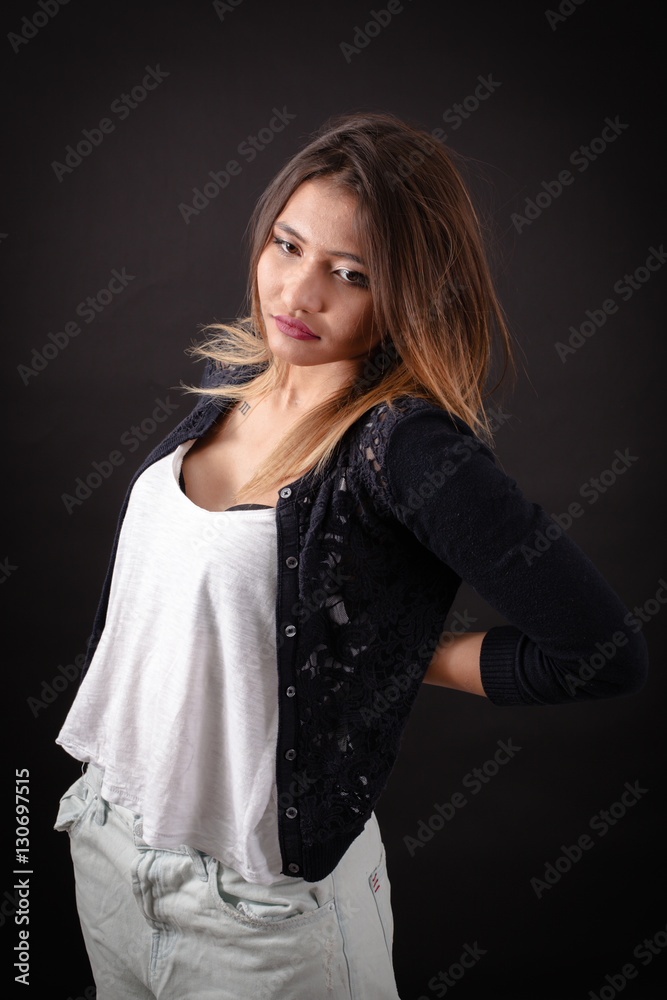 Beautiful woman doing different expressions in different sets of clothes: backache Beautiful woman doing different expressions in different sets of clothes: backache