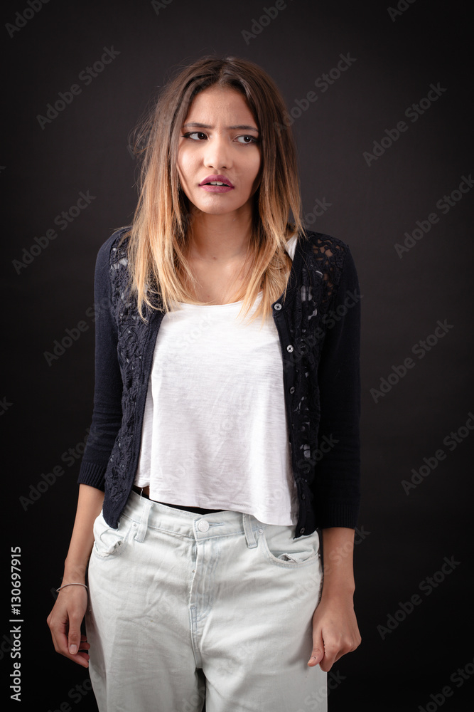 Beautiful woman doing different expressions in different sets of clothes: worried Beautiful woman doing different expressions in different sets of clothes: worried