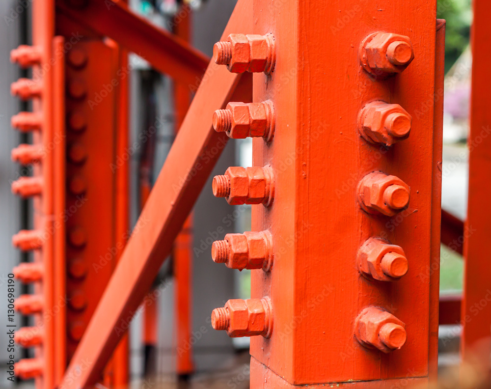 Red bolts for mounting strength of steel structures. Red bolts for mounting strength of steel structures.