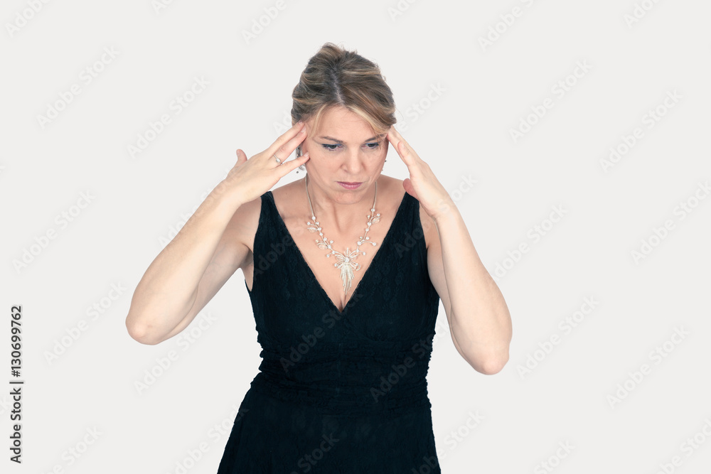 Beautiful woman doing different expressions in different sets of clothes: headache Beautiful woman doing different expressions in different sets of clothes: headache