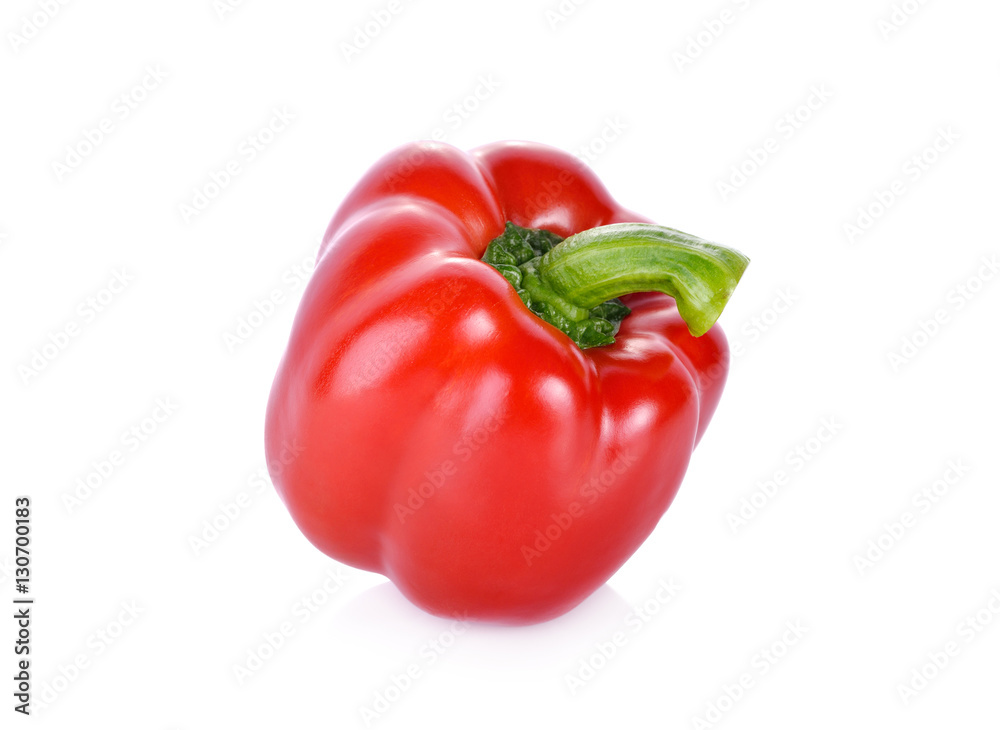 whole fresh red bell pepper with stem on white background whole fresh red bell pepper with stem on white background