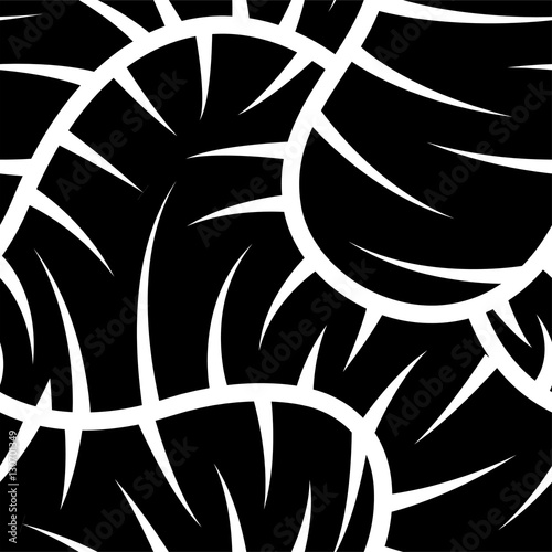 White spikes on black in a seamless pattern