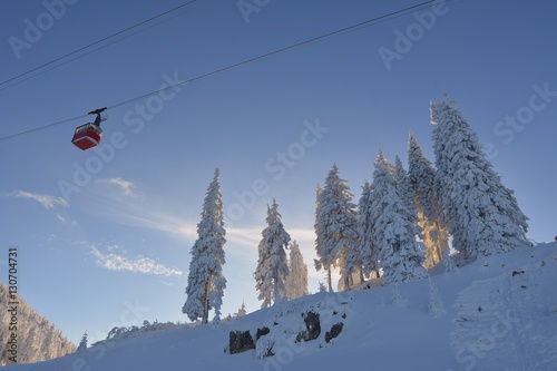 Cable car on ski resort with blue sky background