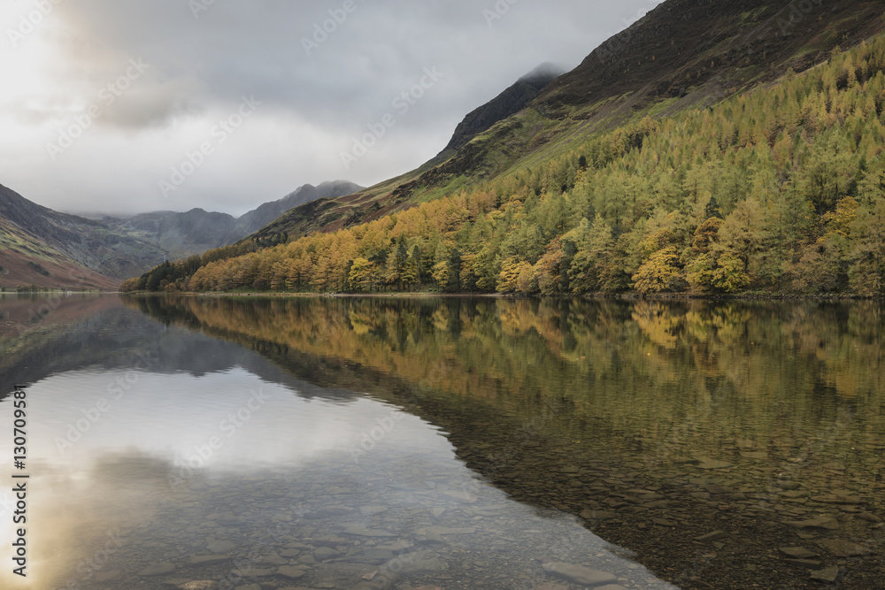 Beautiful Autumn Fall landscape image of Lake Buttermere in Lake