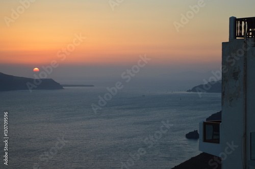 greek sunset w building and islands