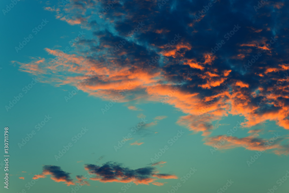 Fluffy orange clouds in winter sunset Fluffy orange clouds in winter sunset
