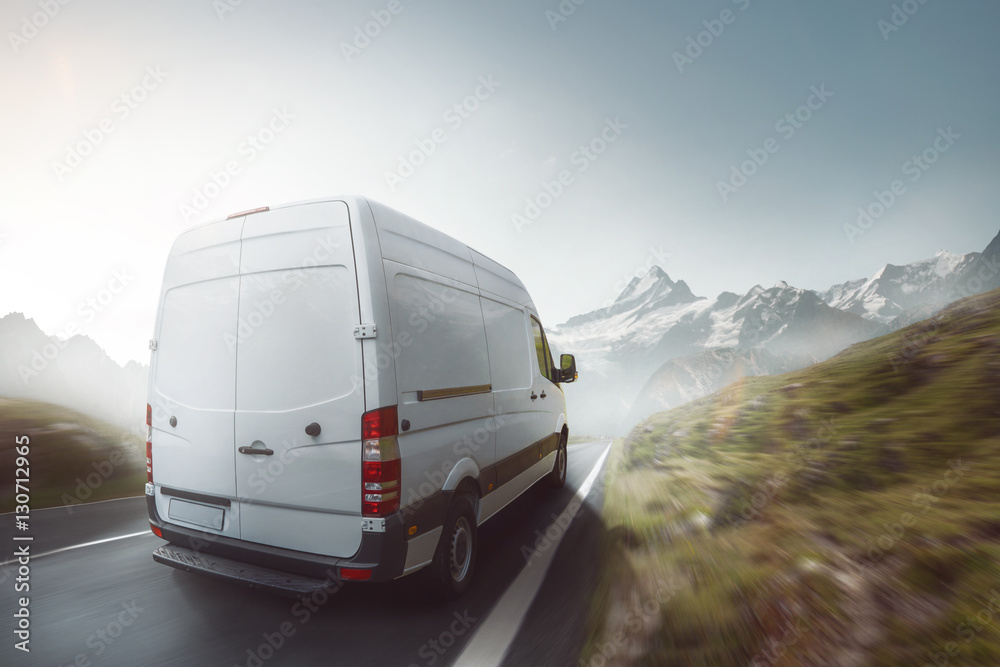 Delivery truck drives on a mountain road Delivery truck drives on a mountain road