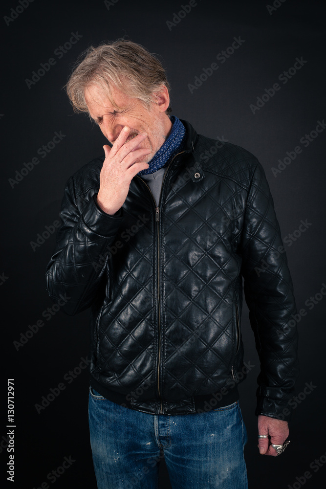 Handsome man doing different expressions in different sets of clothes: yawn Handsome man doing different expressions in different sets of clothes: yawn