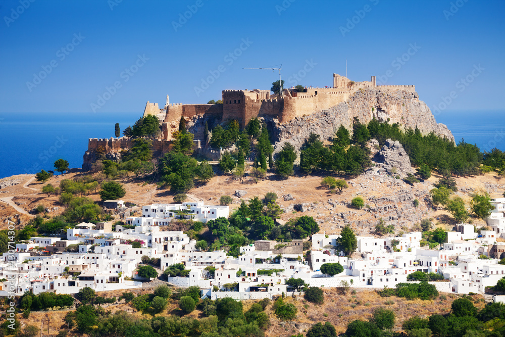 Cityscape of Lindos village and ancient Acropolis