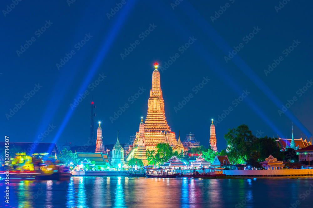 Wat Arun landmark of Bangkok when light show at night.