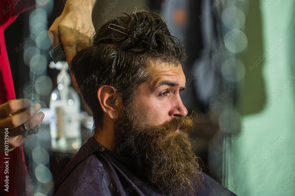 Handsome bearded man in barbershop Handsome bearded man in barbershop
