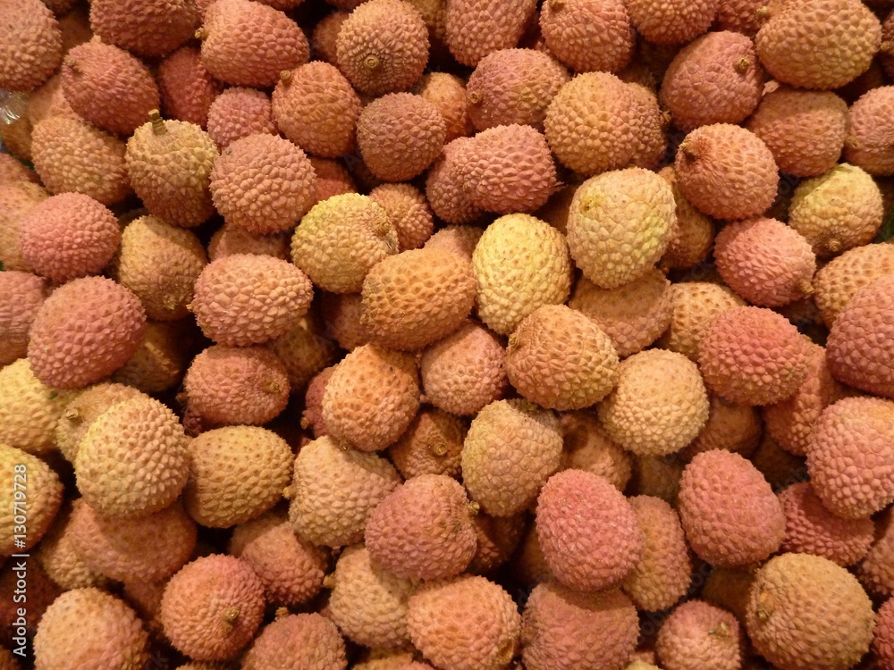 many litchi friit sold at the market many litchi friit sold at the market