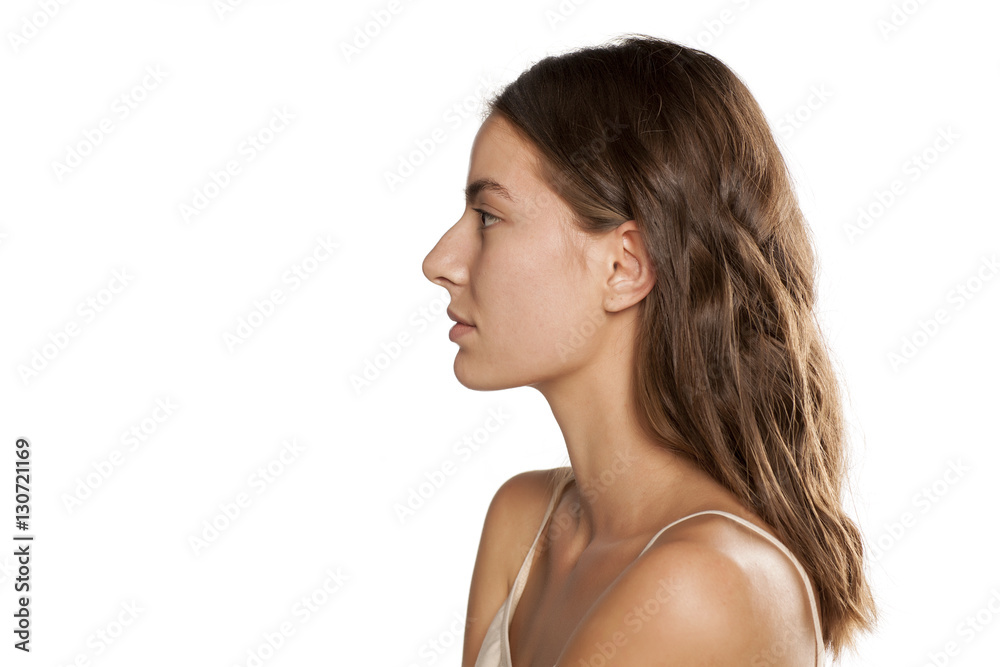 profile of young beautiful woman with long hair and without makeup profile of young beautiful woman with long hair and without makeup