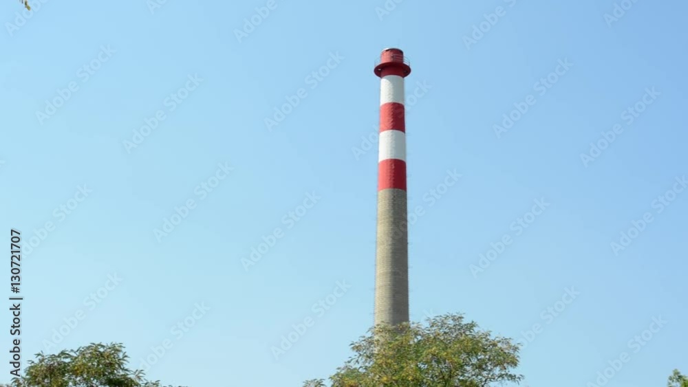 high industry chimney without smoke in the countryside - clear sky high industry chimney without smoke in the countryside - clear sky