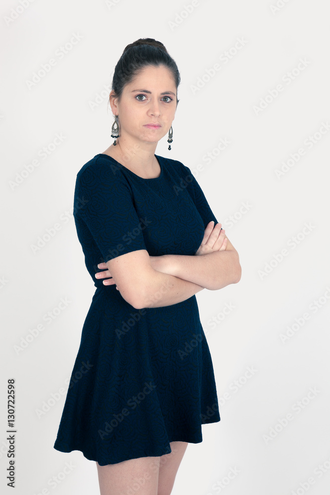 Beautiful woman doing different expressions in different sets of clothes: arms crossed Beautiful woman doing different expressions in different sets of clothes: arms crossed