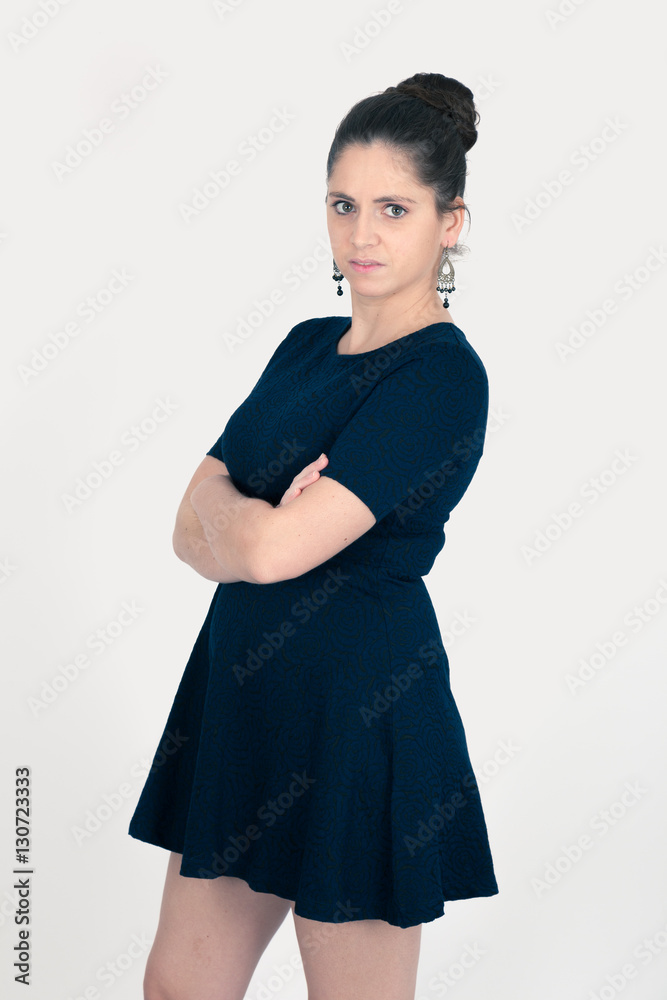 Beautiful woman doing different expressions in different sets of clothes: arms crossed Beautiful woman doing different expressions in different sets of clothes: arms crossed