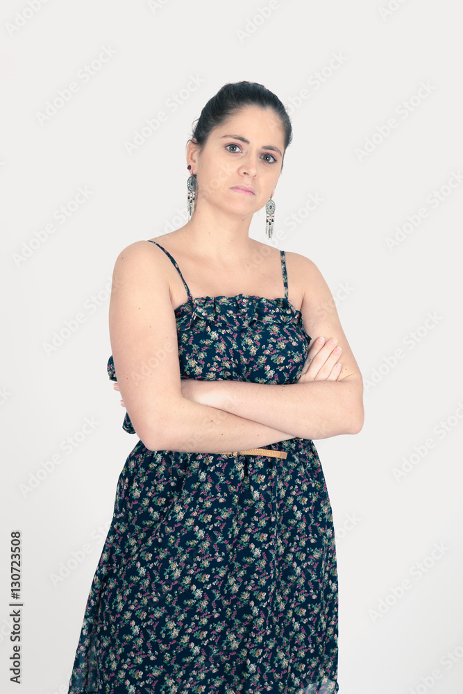 Beautiful woman doing different expressions in different sets of clothes: arms crossed Beautiful woman doing different expressions in different sets of clothes: arms crossed