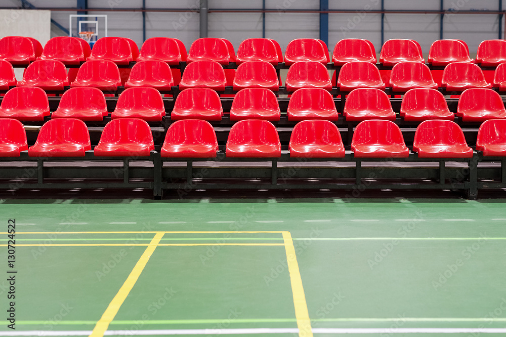Obraz premium red rows of seats in a sports hall