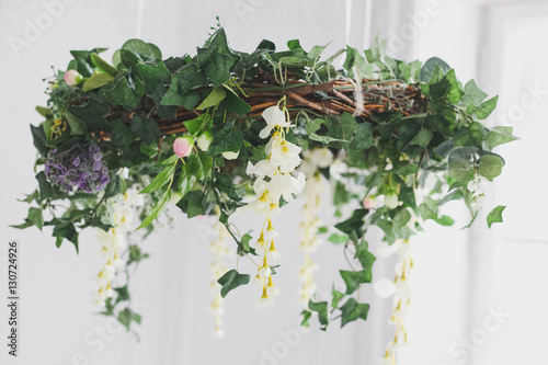 Delicate wreath of white fabric flowers