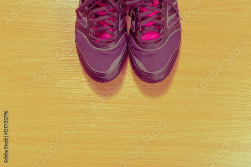running shoes on wooden background