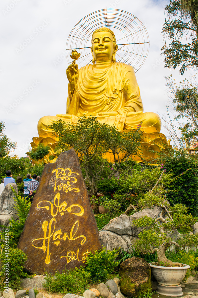 Golden Buddha statue at Dalat city Vietnam