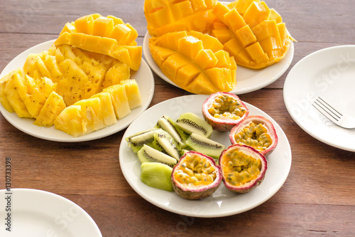 Fruit mix on a white plate with natural lighting
