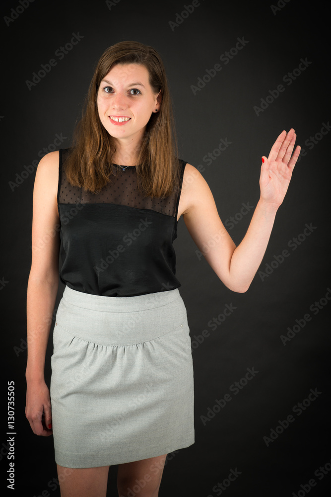 Beautiful woman doing different expressions in different sets of clothes: wave Beautiful woman doing different expressions in different sets of clothes: wave