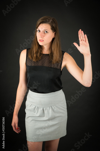 Beautiful woman doing different expressions in different sets of clothes: be careful