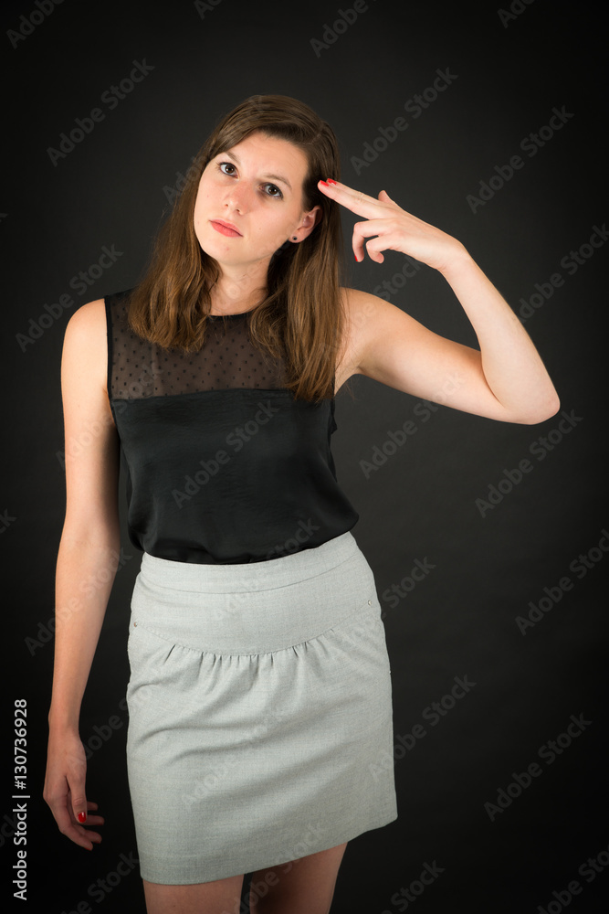 Beautiful woman doing different expressions in different sets of clothes: suicide Beautiful woman doing different expressions in different sets of clothes: suicide