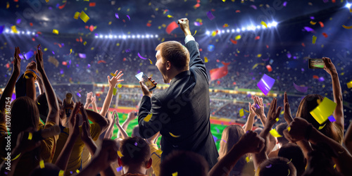 Fans on stadium game businessman © Anna Stakhiv