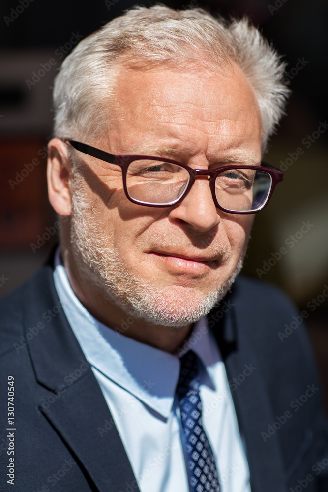close up of senior businessman in eyeglasses close up of senior businessman in eyeglasses