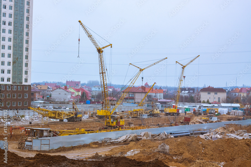 Big construction yard with cranes 