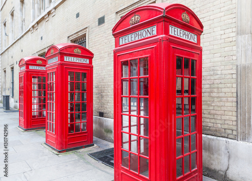 Three Red London Telephone boxes all in a row