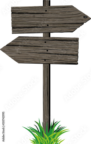 Wooden pattern sign two arrows in different directions in grunge style and green grass isolated on white background. Road sign.