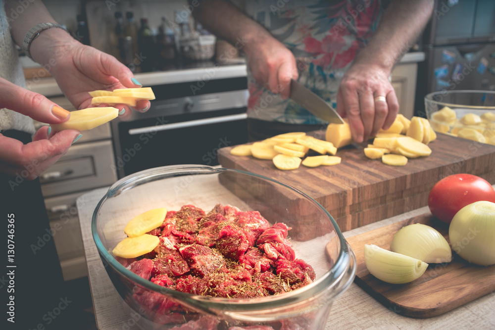 Cooking baked meat with potatoes  and vegetable