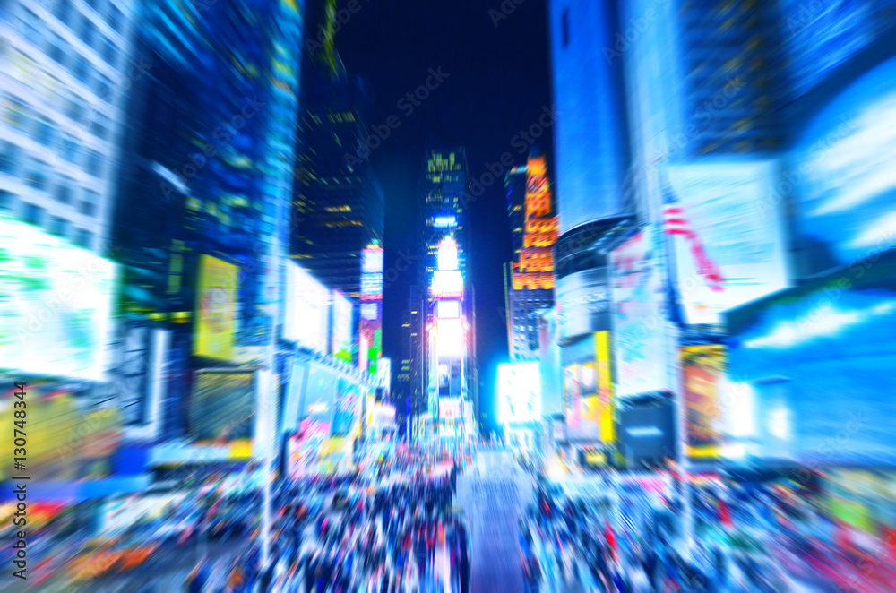 View of Times Square at night in New York City with motion effect