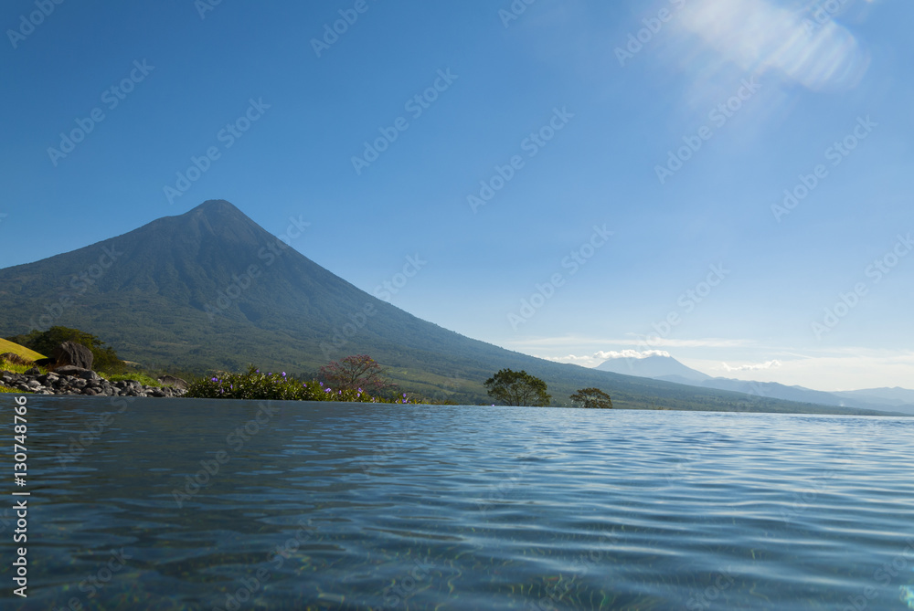 Pool in golf Club in Guatemala and volcano