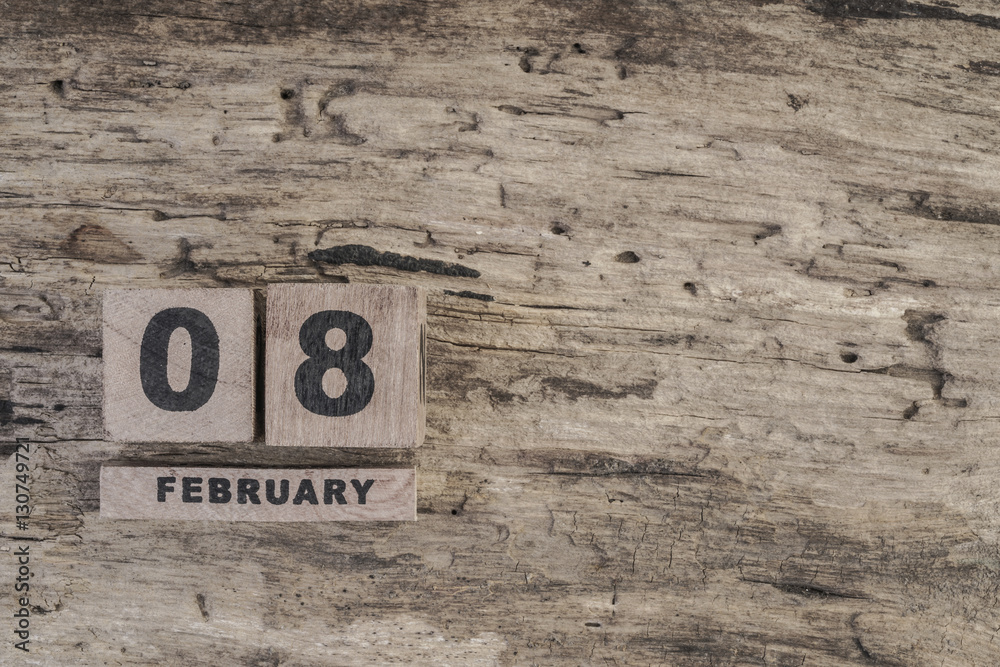 cube calendar for february on wooden background cube calendar for february on wooden background