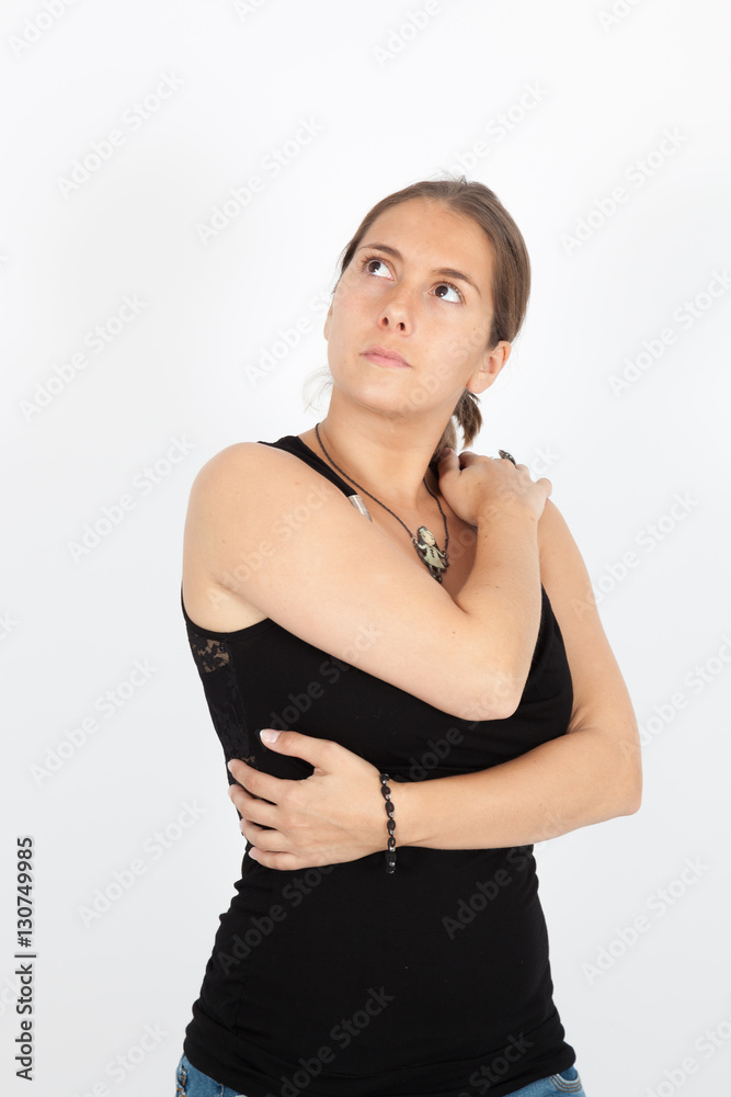 Beautiful woman doing different expressions in different sets of clothes: arms crossed