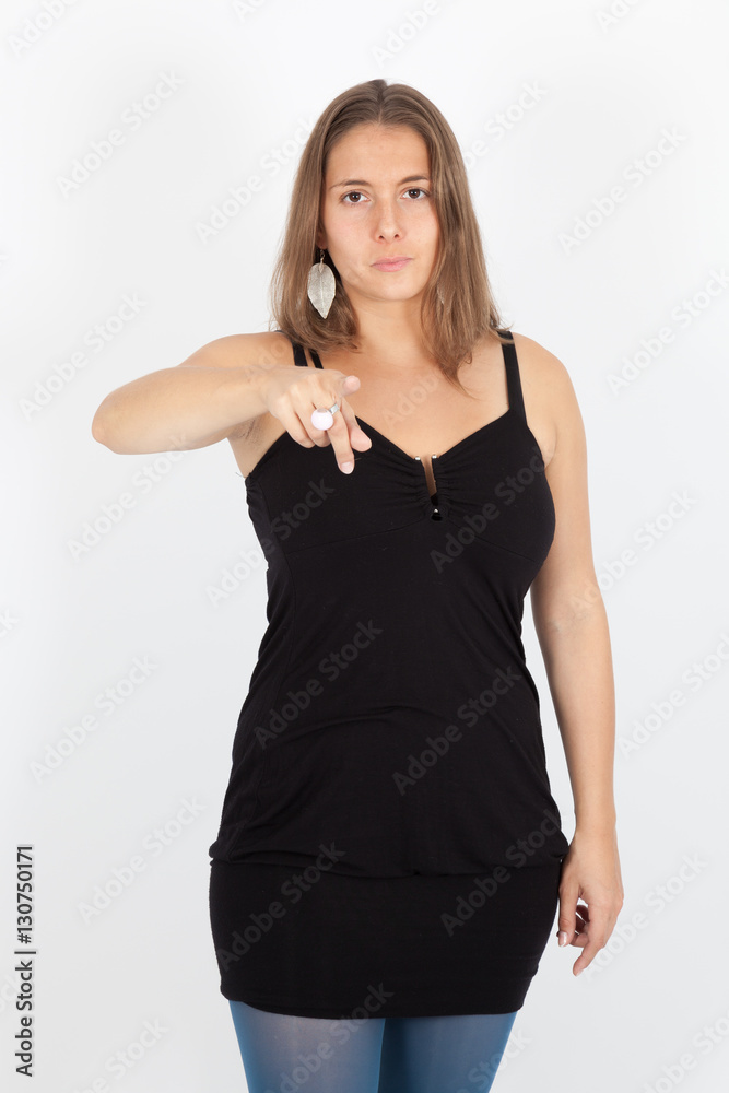 Beautiful woman doing different expressions in different sets of clothes: pointing Beautiful woman doing different expressions in different sets of clothes: pointing