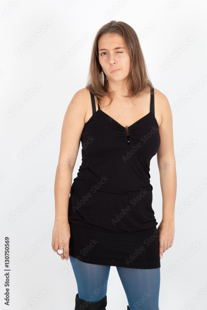 Beautiful woman doing different expressions in different sets of clothes: blink Beautiful woman doing different expressions in different sets of clothes: blink