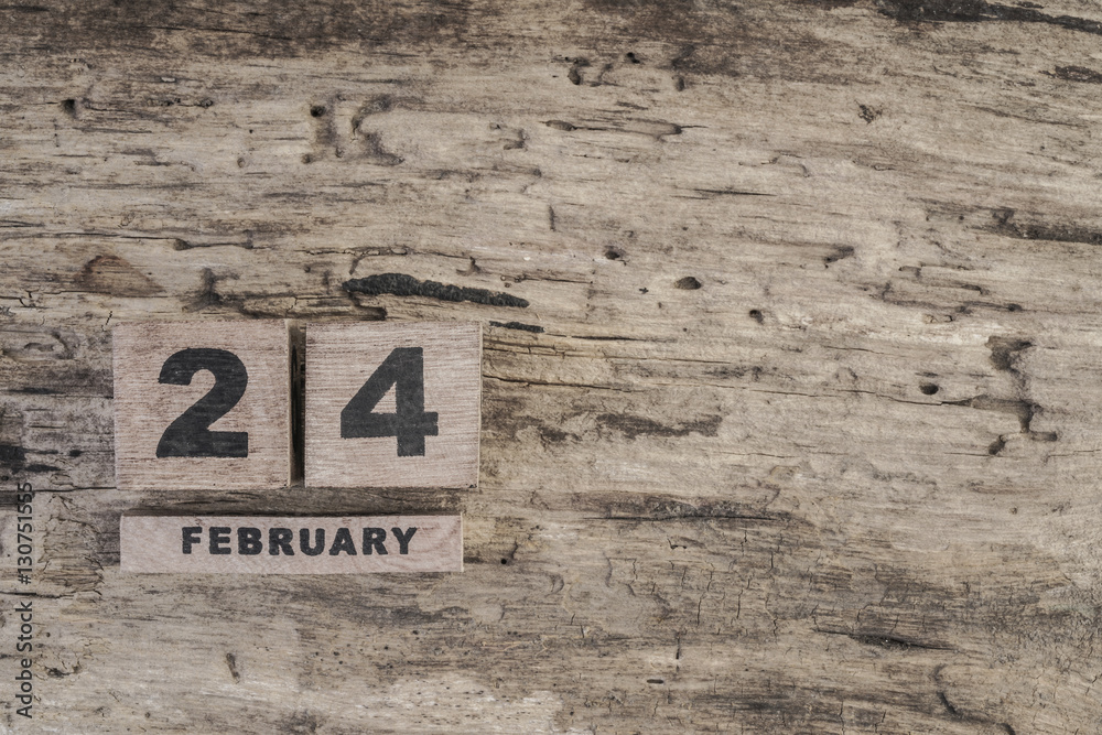cube calendar for february on wooden background cube calendar for february on wooden background