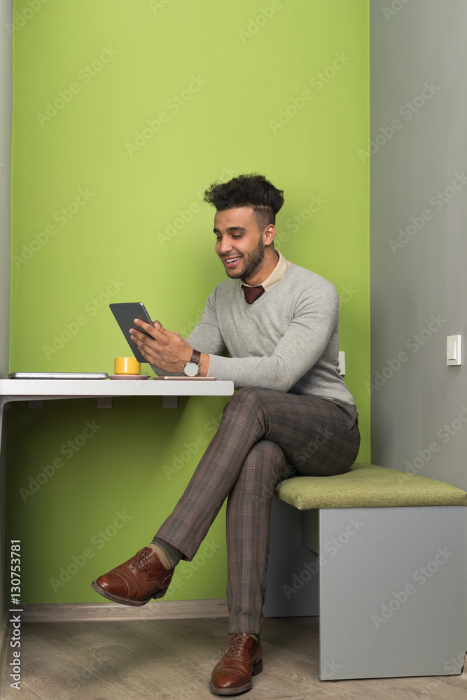 Hispanic Business Man Using Tablet Computer Businessman In Coworking Center Cafe Coffee Break Modern Office Interior
