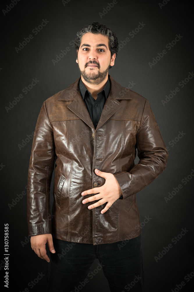 Handsome man doing different expressions in different sets of clothes: hungry Handsome man doing different expressions in different sets of clothes: hungry