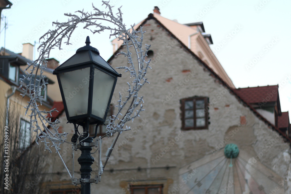 Vintage lamp with Christmas decoration in Tkalciceva street - picturesque street in Zagreb, Croatia. 