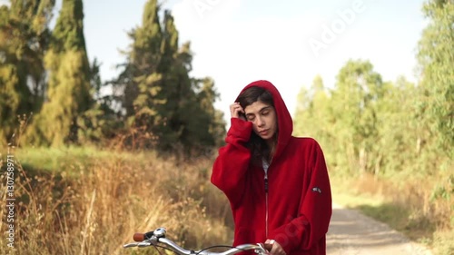 girl with bicycles in the nature 