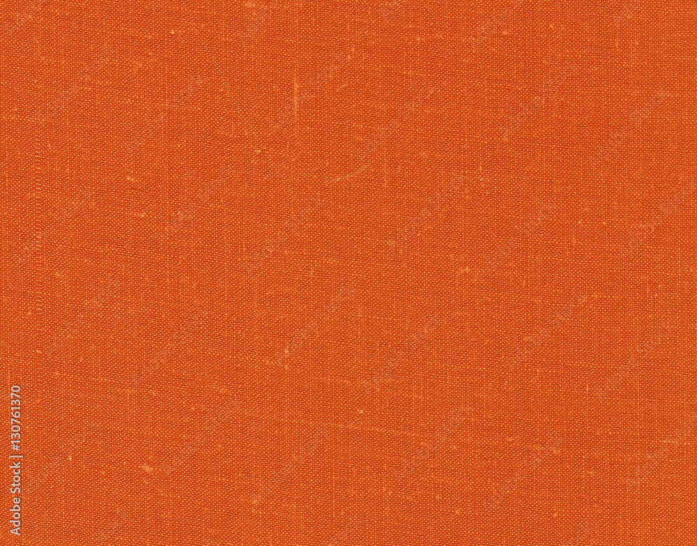 Fototapeta premium Orange color textile cloth texture.